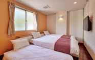 Phòng ngủ 2 The Trip Inn Okinawa Rycom