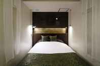 Kamar Tidur Hotel The Lotus Bali - Adult Only