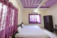 Bedroom Hotel Radhika Inn
