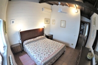 Kamar Tidur Poggiolindo B&B