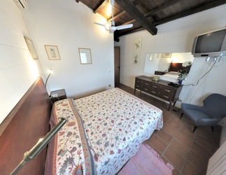 Kamar Tidur 2 Poggiolindo B&B