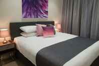 Kamar Tidur Mayfield Short Stay Apartments