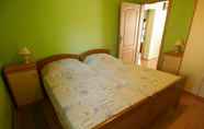Bedroom 6 Apartments and Rooms Pavek
