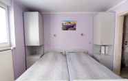 Bedroom 5 Apartments and Rooms Pavek
