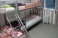 Kamar Tidur Beatriz Hostel