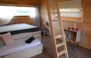 Kamar Tidur 2 Glamping Kolpa Resort