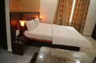 Bedroom Hotel Akshat Residency