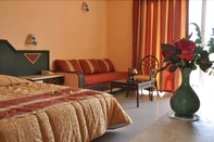 Bedroom Hôtel Narcis - Adults Only