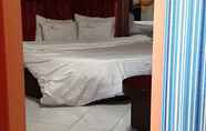 Kamar Tidur 5 Khan Motel