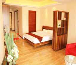 Kamar Tidur 4 Huidong Ganghui Holiday Hotel