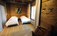 Bedroom 6 LAURI Historical Log House Manor