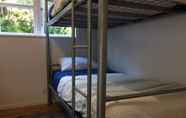 Bilik Tidur 4 Hekerua Lodge Boutique Backpackers