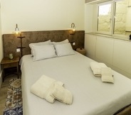 Phòng ngủ 6 Guest H4U Flores Almada City center