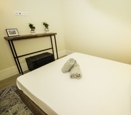 Phòng ngủ 3 Guest H4U Flores Almada City center