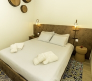 Phòng ngủ 4 Guest H4U Flores Almada City center