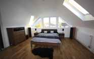 Bedroom 5 Four Corners Holiday Home with Hot Tub & Sauna