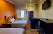 Kamar Tidur 7 Le Blanc Inn & Suites