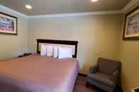 Bilik Tidur Le Blanc Inn & Suites