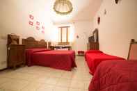 Phòng ngủ Tenuta Antico Monastero