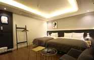 Kamar Tidur 6 Asome Hotel