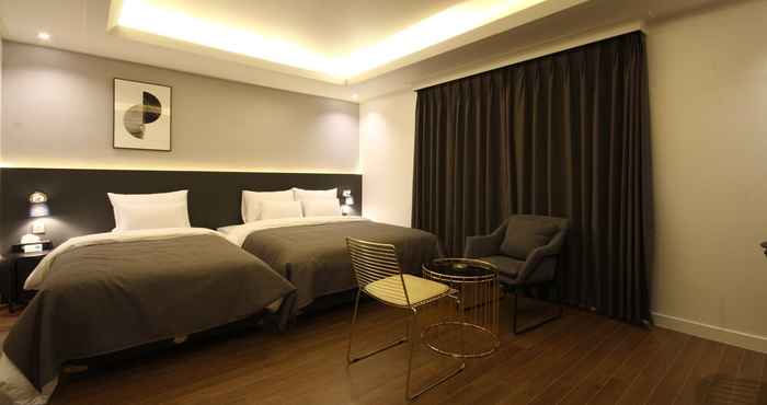 Kamar Tidur Asome Hotel