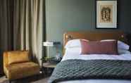 Bedroom 6 Home Suite Hotels Rosebank