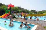 Swimming Pool Happy Camp in Camping Bella Sardinia