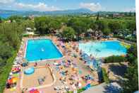 Swimming Pool Happy Camp in Camping Cisano San Vito