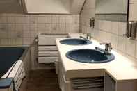 In-room Bathroom Ebnisee Apartments