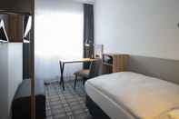 Bedroom Platzhirsch Hotel