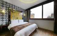 Kamar Tidur 7 Carlton Hotel