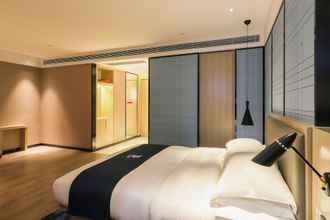 Bedroom 4 ECHARM HOTEL（Xi Qiao Shan, Foshan）