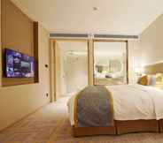 Bedroom 6 Howard Johnson by Wyndham Glory Plaza ChengHai