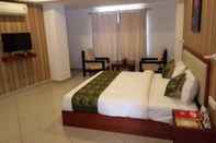 Kamar Tidur Queens Hotel