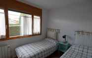 Bedroom 2 Cozy Apartment in Alp