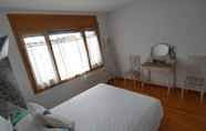 Bedroom 7 Cozy Apartment in Alp