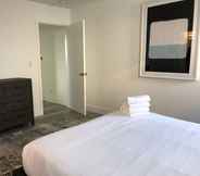 Bedroom 2 Brand NEW Luxury Spacious 3bdr Townhome Close to 3rd St