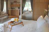 ห้องนอน Porto Vecchio Luxury Suites