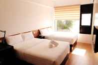 Kamar Tidur Travelbee Seaside Inn