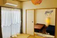 ห้องนอน Midtown Sakura Apartment House 101