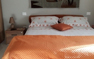 Bilik Tidur 6 B&B Trulli e Mare