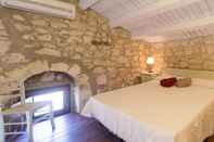 ห้องนอน Casale del Coccio