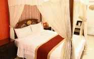 ห้องนอน 5 Mi Casa Inn