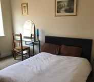 Kamar Tidur 6 Lovely Friendly House Stay