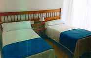 Kamar Tidur 3 Hotel Plaça Vella