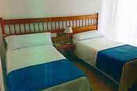 ห้องนอน Hotel Plaça Vella