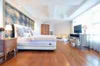 ห้องนอน 4BR Cozy Tropical Retreat Penthouse