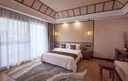 Kamar Tidur 7 Xishuangbana Yunshangpin Hotel