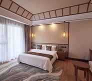 Bedroom 7 Xishuangbana Yunshangpin Hotel