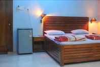 ห้องนอน Hotel Nakshatra